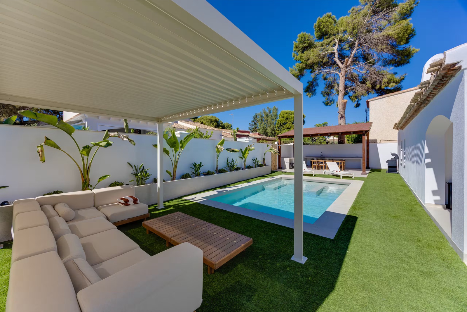 Pool cabana with sofas